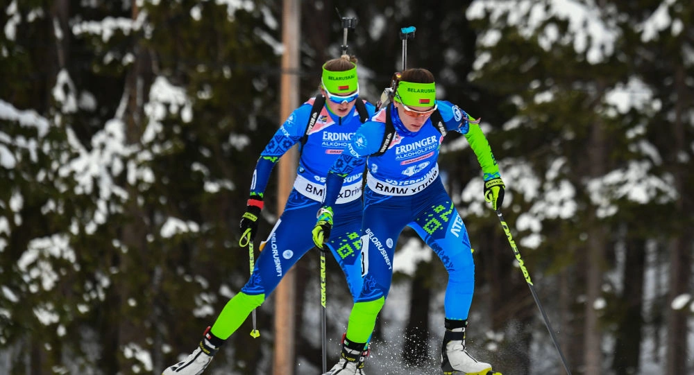 Биатлонисты Динара Алимбекова и Антон Смольский заняли 8-е место в Рождественской гонке